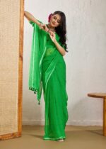green leheriya chiffon saree with fancy blouse & weaving border